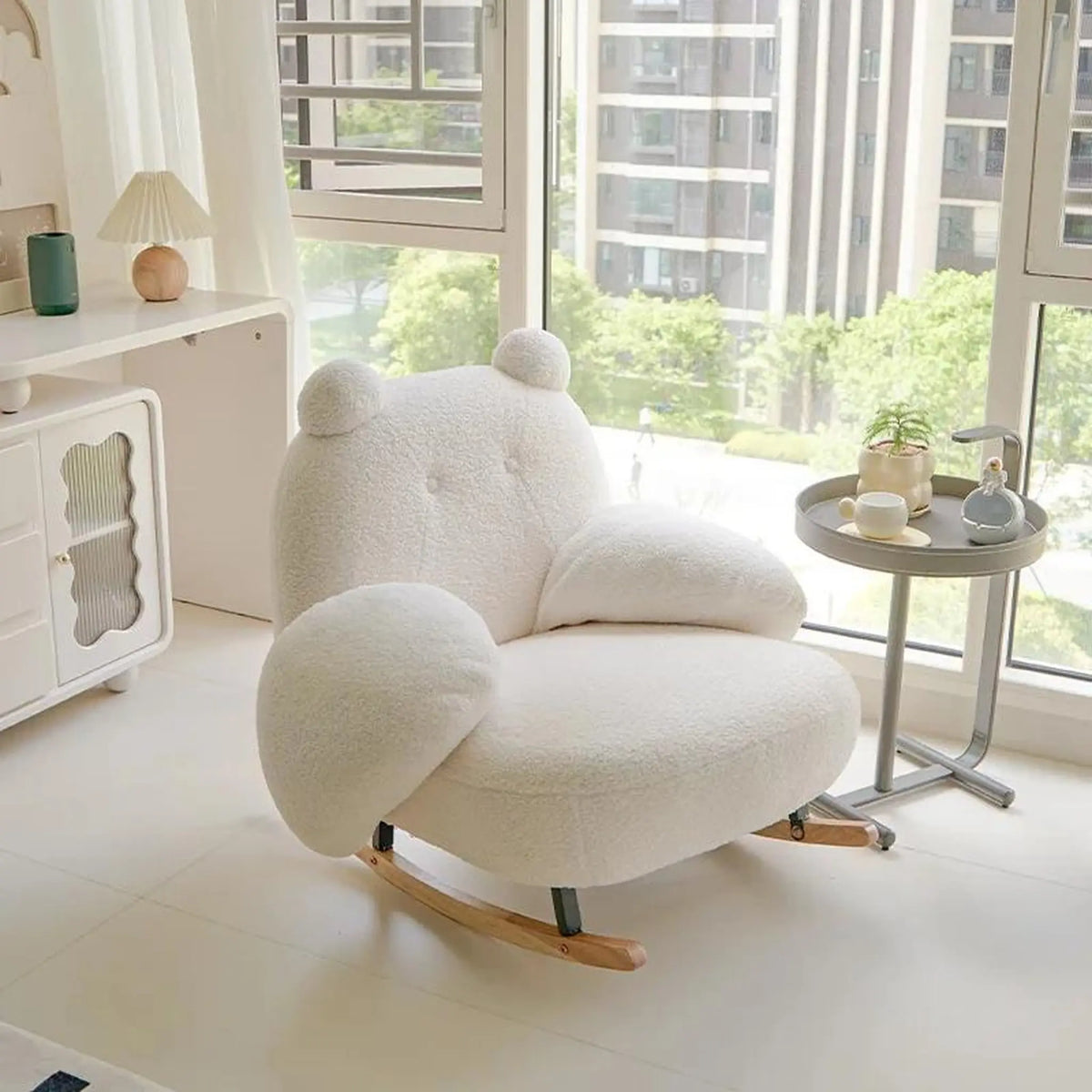 Fauteuil à bascule bouclé blanc