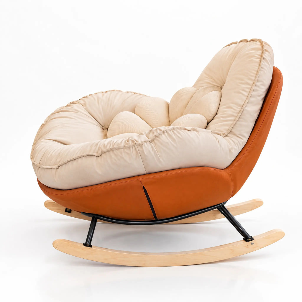 Fauteuil à bascule coque orange et coussin crème vu de profil
